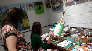Sarah Seymour demonstrating portrait painting at the Caversham Arts Trail